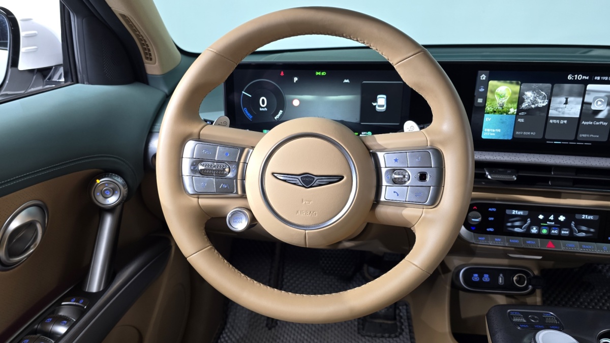 Genesis GV60, 2023 — фото 12 из 12