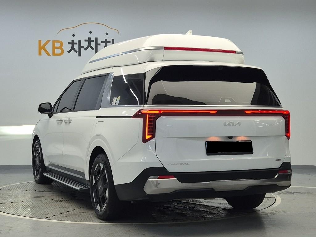 Kia Carnival, 2024 — фото 2 из 12