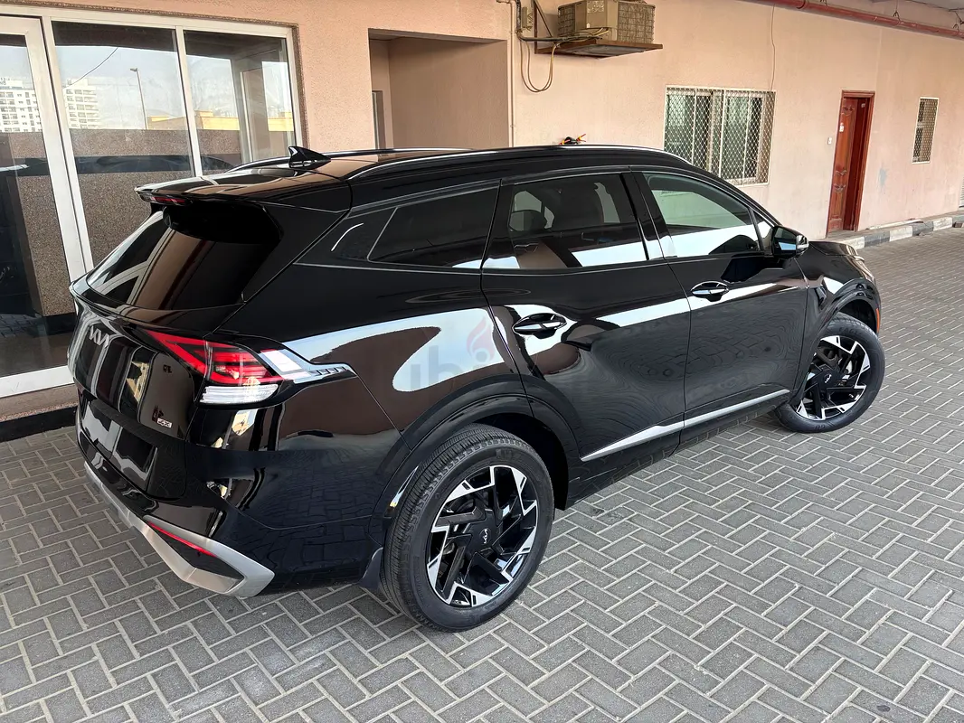 Kia Sportage, 2023 — фото 4 из 10
